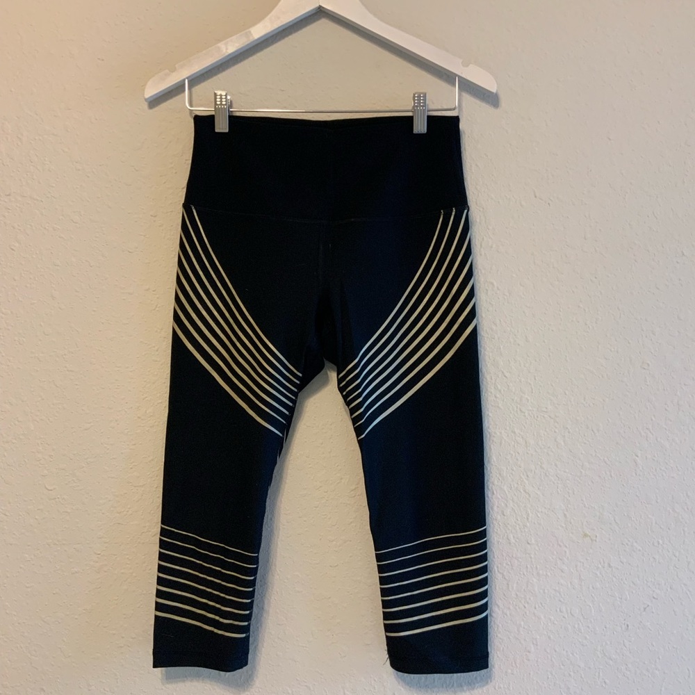 RBX black and gold capri leggings size small